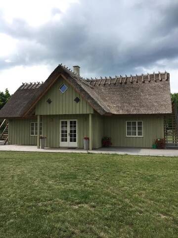 Фото номера Дом с 4 спальнями Загородные дома Padaste Valja Apartments г. Пядасте 3